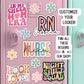 a pink refrigerator with lots of stickers on it